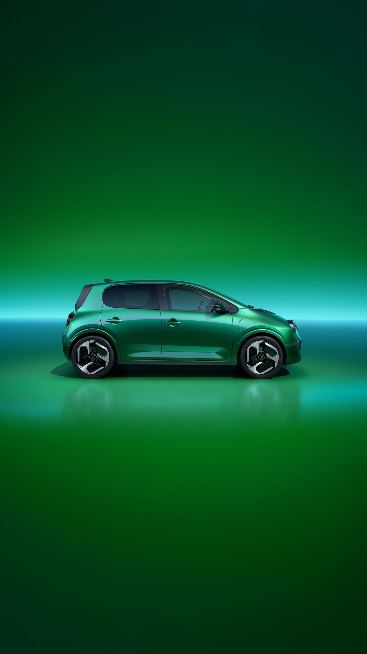 Renault Twingo E-Tech in Vert Absolu, Seitenansicht im Studio